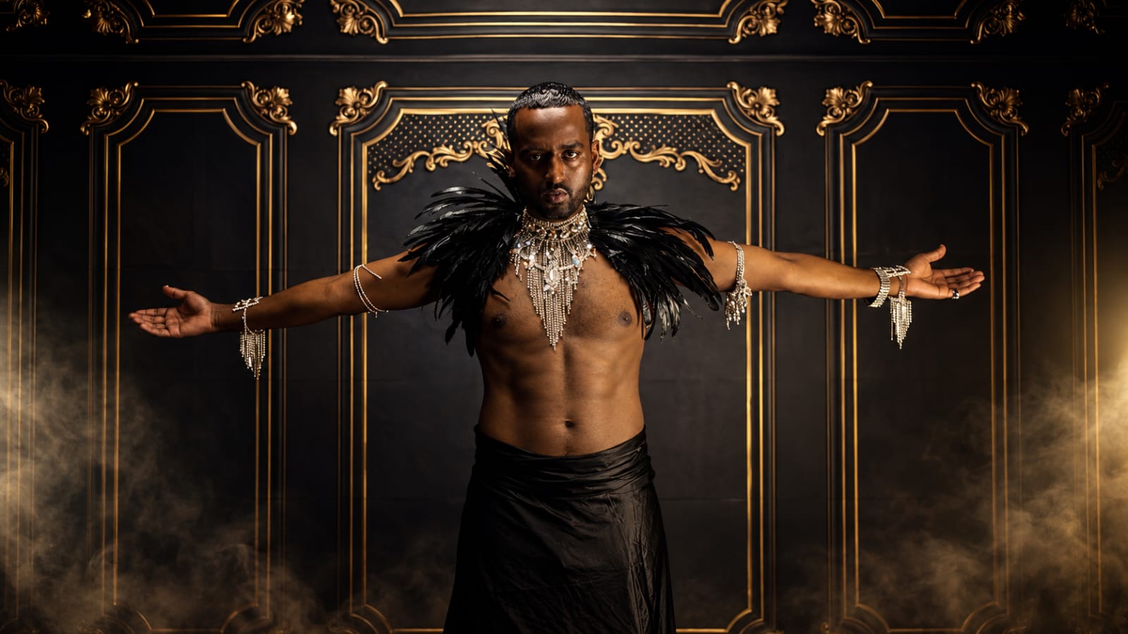 Nestra in performance attire with dramatic feathered styling and jeweled accessories